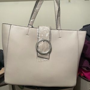 Large tote brand new alabaster is the color - just too big for my needs .